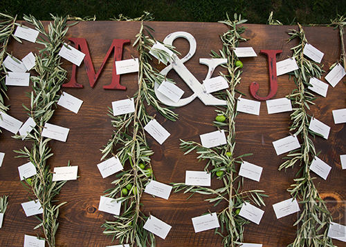 Escort cards for a vineyard wedding in the Hamptons by Shindig Bespoke. Photo by Christian Oth Studios
